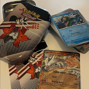 Pokemon Tin with Reshiram GX and Assorted Cards
